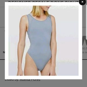 Lululemon Bodysuit seek the heat sz 8